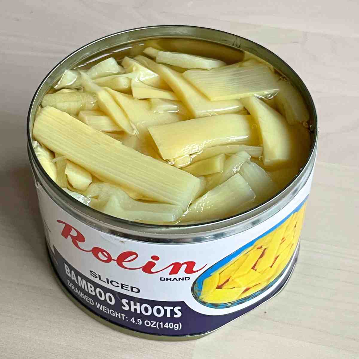 strips of bamboo shoot in a tin close up