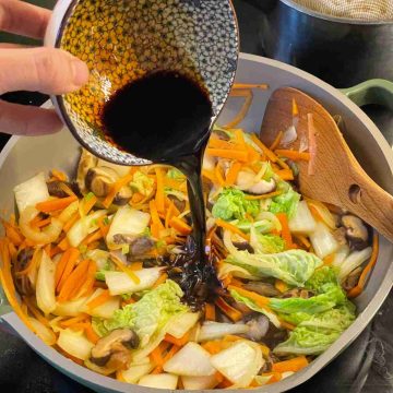 add yaki udon sauce to pan