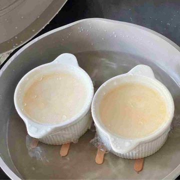 Steam custard egg pudding in boiling water