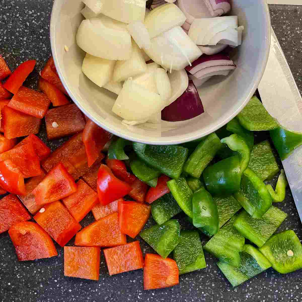 Chop onion green and red peppers