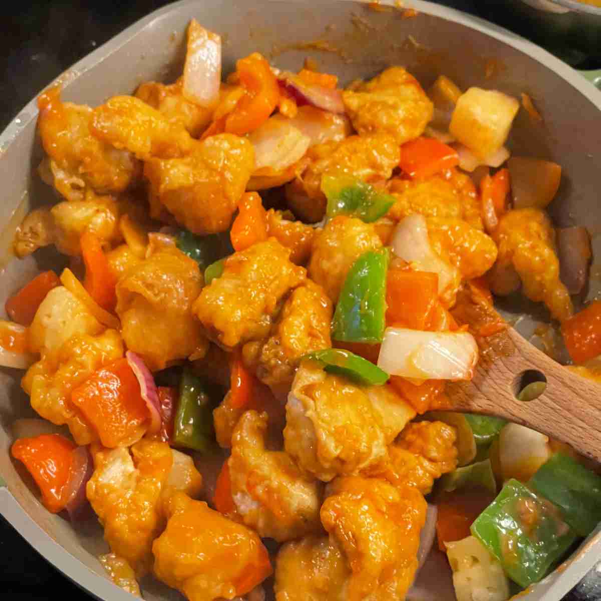 Sweet and sour chicken balls with pineapple
