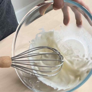 Whisk small amount whipping cream