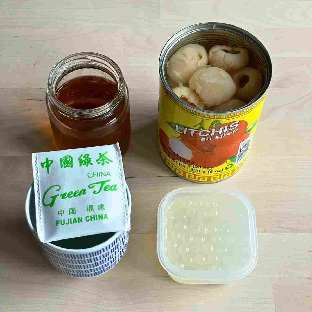 lychee fruit tea ingredients with popping pearls