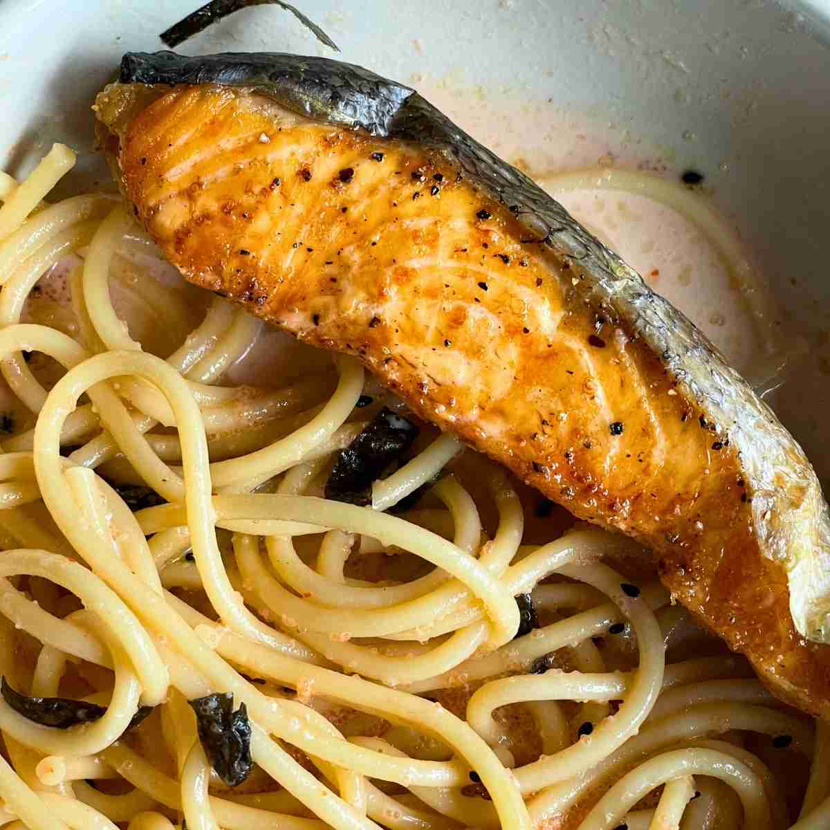 seared salmon on spaghetti