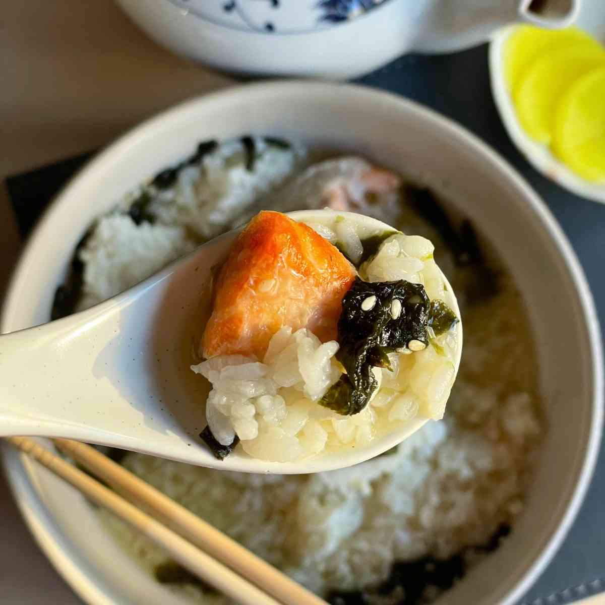 bite of salmon nori and rice