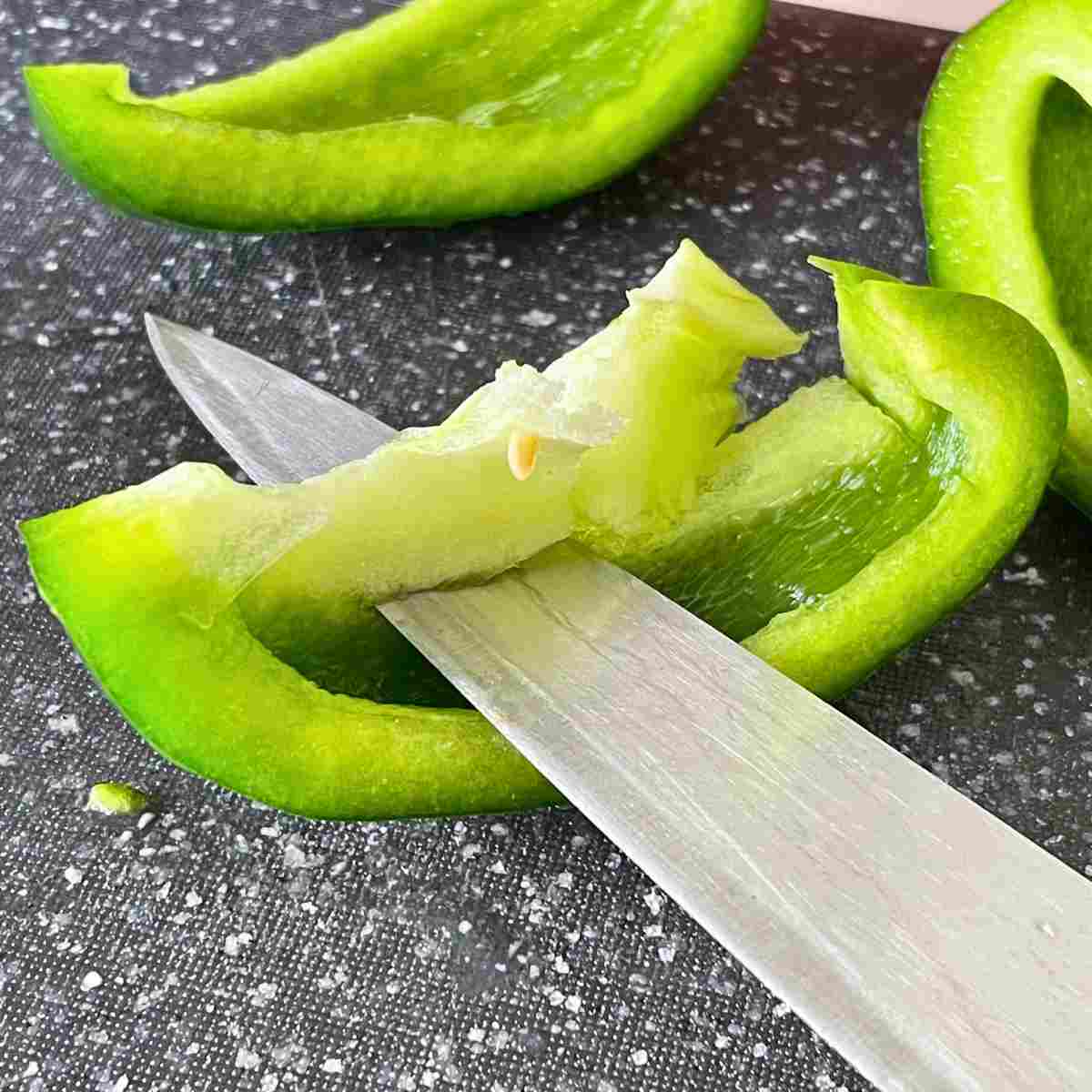 Remove seeds white part bell pepper