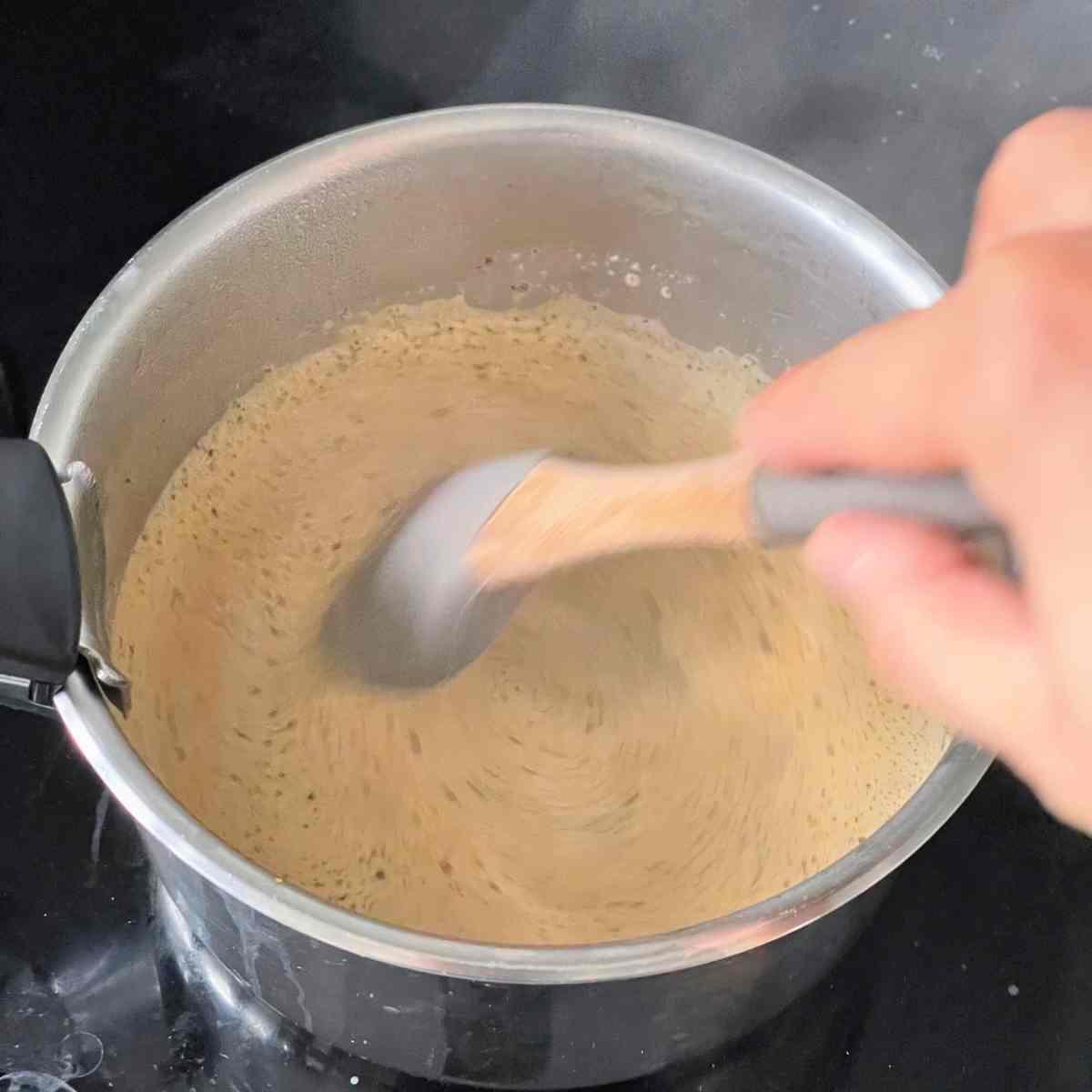 stir and simmer chai spice into milk
