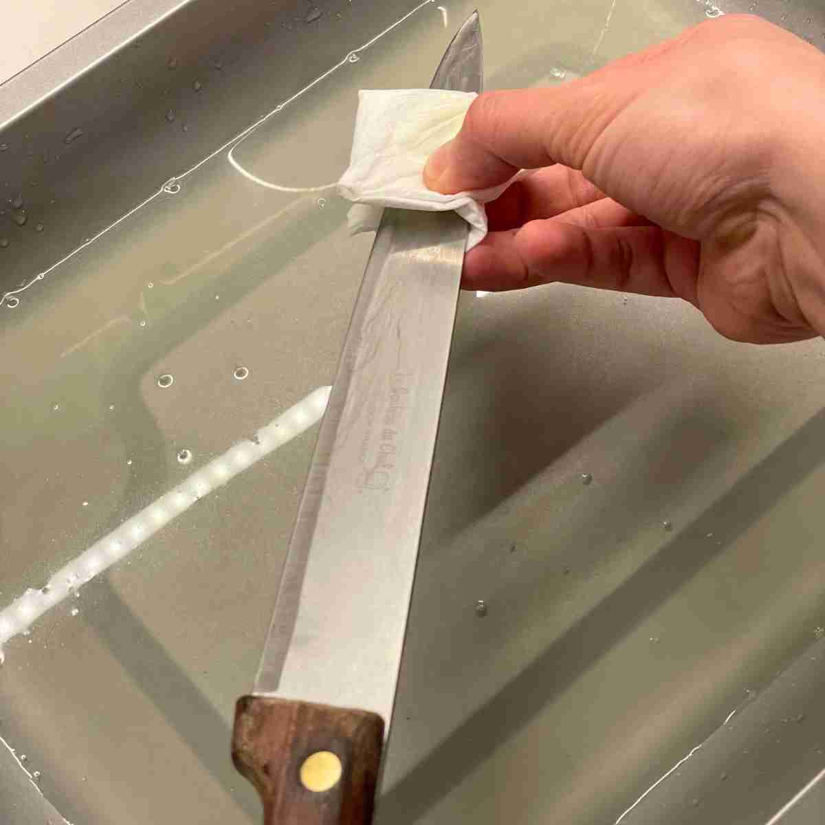 Heat and clean knife after every cut