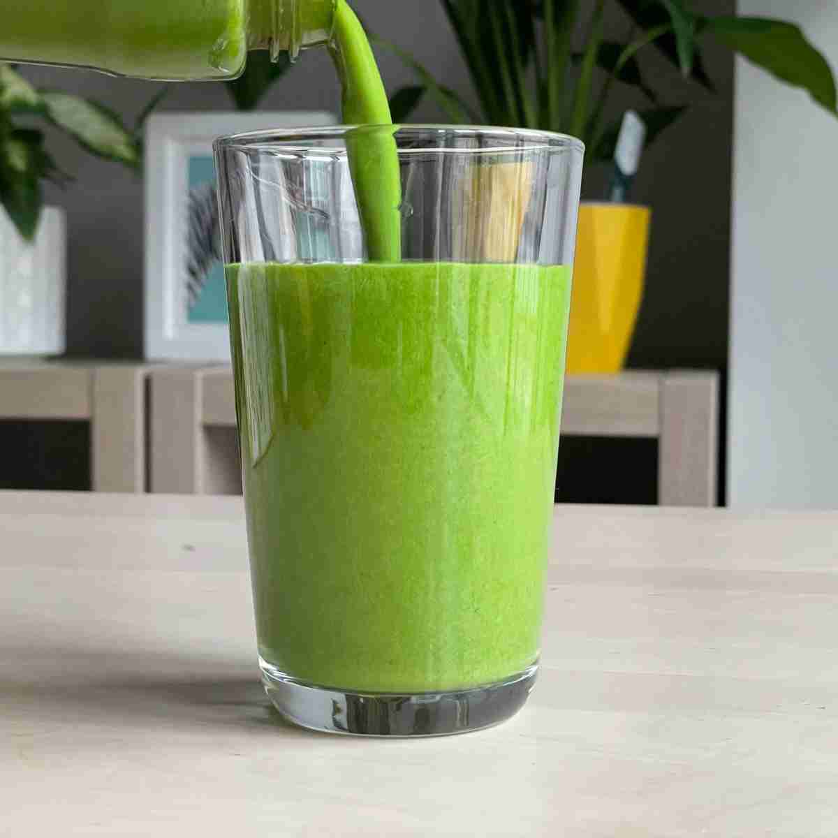 pour sweet matcha smoothie into glass